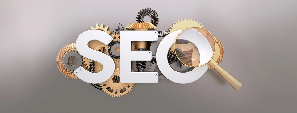 SEO letters with gears and magnifying glass representing search engine optimization