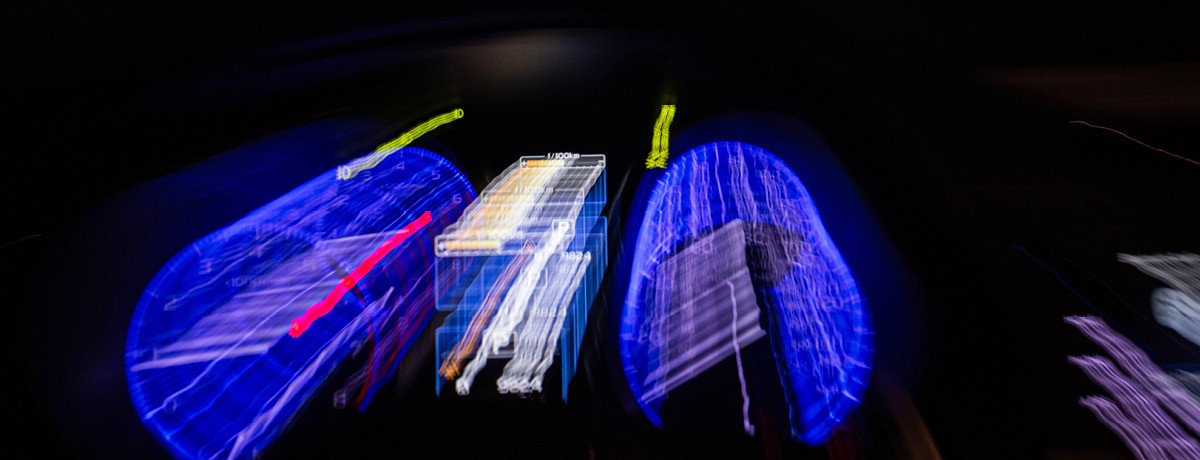 Close-up of a car dashboard displaying high speed