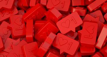 Red icons with hearts and the number one, symbolizing online interactions.