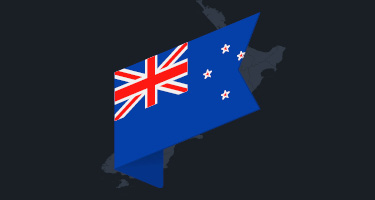 New Zealand flag over image of country outline