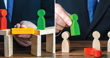 Hand moving multicolor blocks