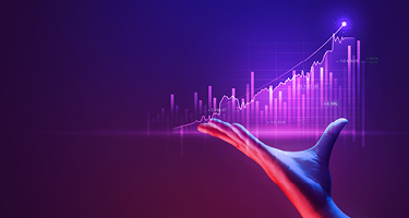 Glowing hand holding up chart against blue and purple background