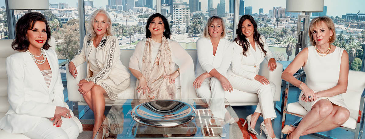Six female lawyers sitting in office