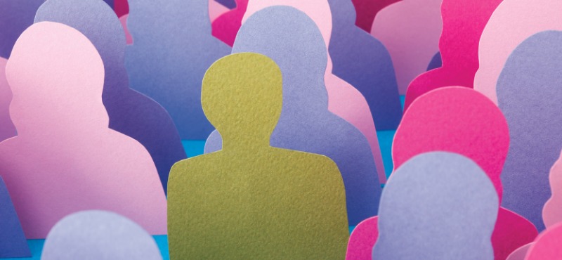 Discrimination against one gold person in a room full pink people