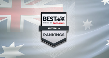 Grey and white badge depicting Best Law Firms Australian with Australian flag in background