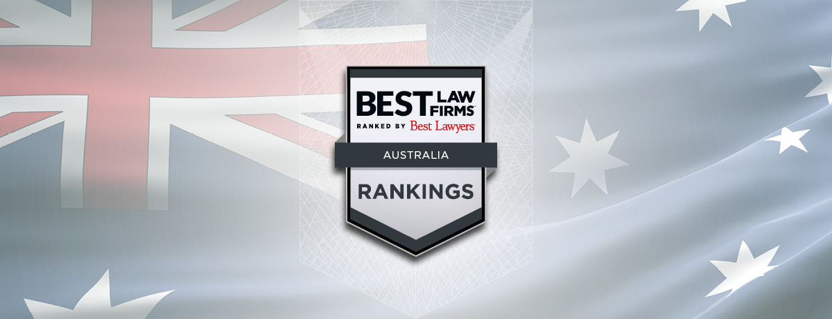 Grey and white badge depicting Best Law Firms Australian with Australian flag in background