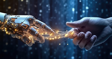 Robotic hand about to touch human hand connected by wires