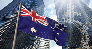 Australian flag with buildings in background
