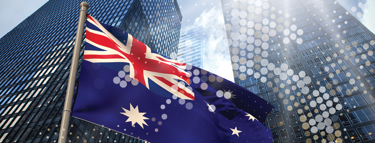 Australian flag with buildings in background