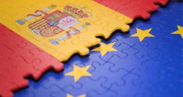 A jigsaw puzzle forming the flag of Spain and the European Union 
