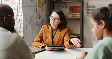 School official informs parent of child who changed genders  