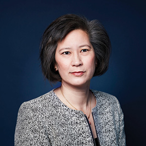 Lawyer dressed professionally poses for headshot