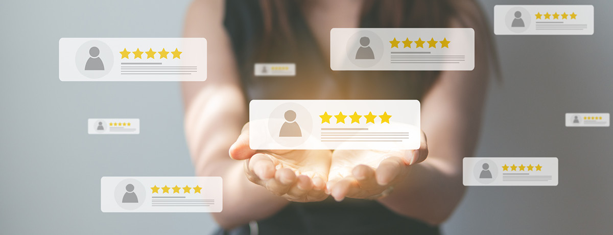 Woman holding blurb of online reviews