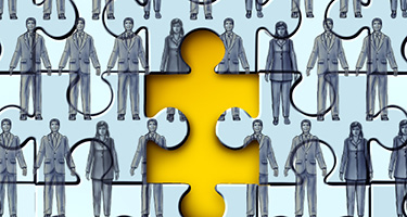 Puzzle with people on it with missing yellow piece