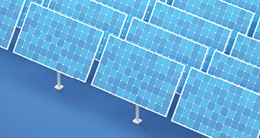 Blue solar panels lined up in front of blue backdrop