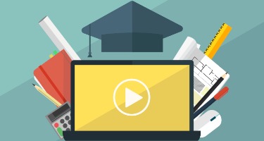 Image of a laptop surrounded by educational tools and stationery