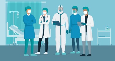 Medical professionals in hospital attire standing together
