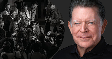 Dan Cogdell headshot on dark gray background