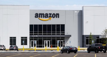 Amazon warehouse with a giant parking lot
