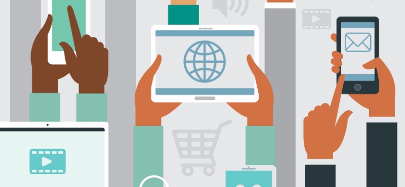 Multiple people with electronic devices accessing different parts of the web