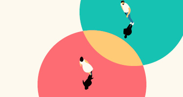 People standing in opposite circles forming Venn diagram