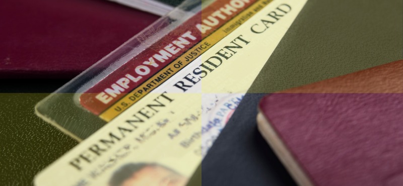 H-1B RFEs with an image of a man on a card with an employment authorization card behind it