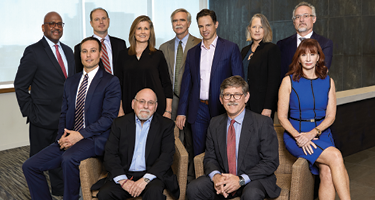 Koskoff Koskoff & Bieder’s litigation team smiles for a group photo