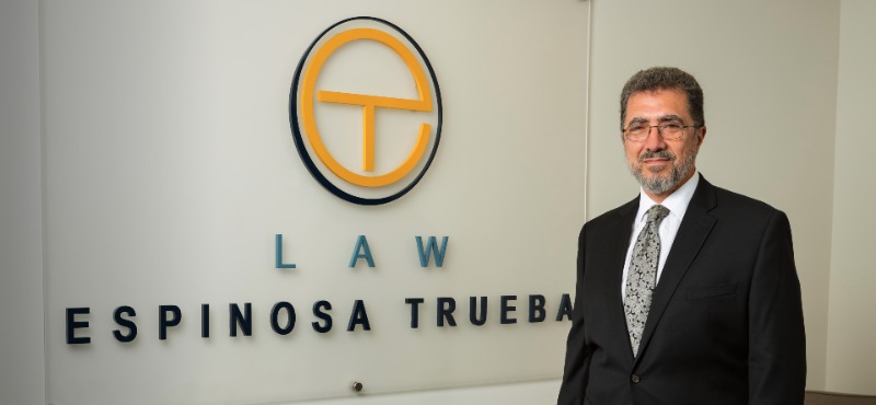 Partner Jorge Espinosa poses outside of Espinosa Trueba Martinez Law Firm 