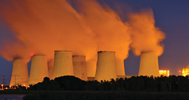 Power plant billowing smoke