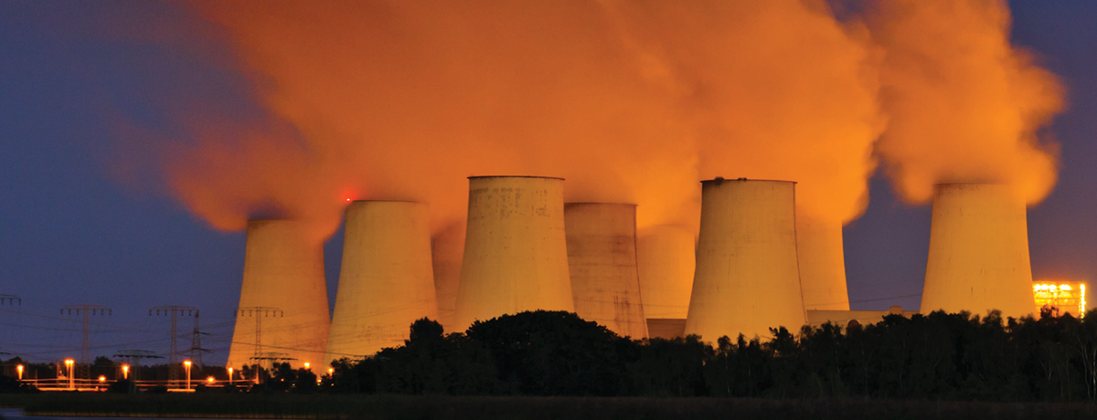 Power plant billowing smoke