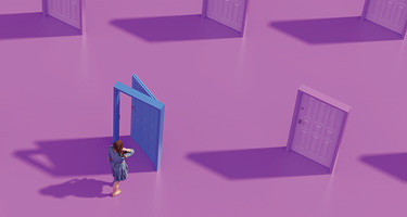 Woman in front of open blue door