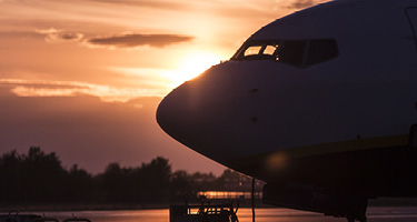 Airplane on Tarmac in the Sunset