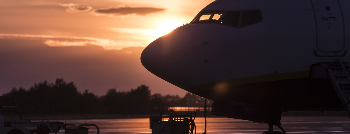 Airplane on Tarmac in the Sunset