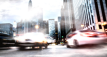 Blurry image of fast moving traffic in big city