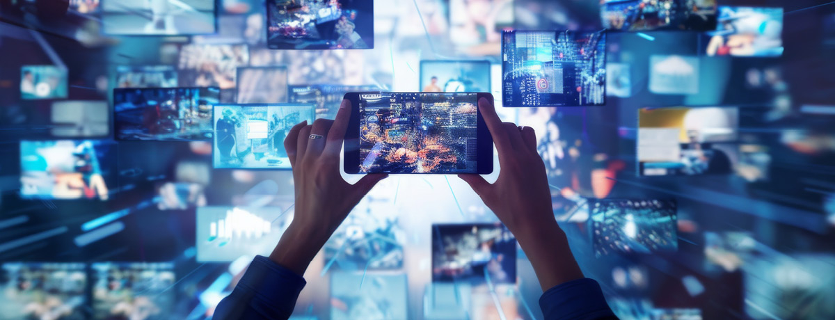 Person holding a smartphone surrounded by floating digital screens, illustrating the use of video co