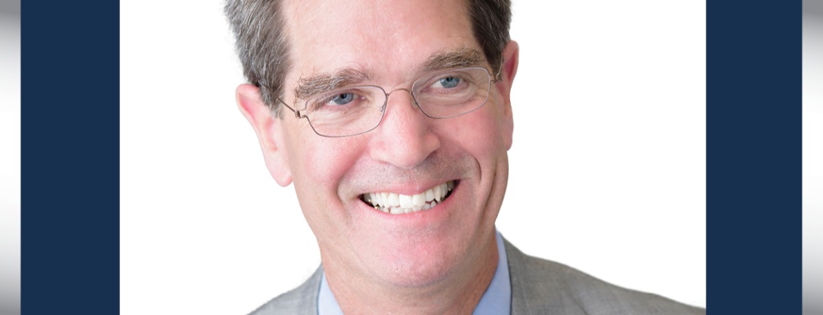 Headshot of John Relman