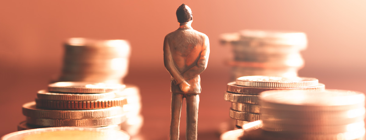 A lone business figure stands between stacks of coins, symbolizing the growing influence of private 