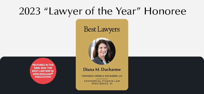 Lawyer in suit with dark hair smiling for headshot