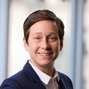 Lawyer with suit posing and smiling for headshot