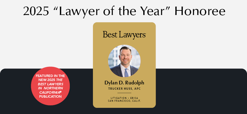 Man in suit and tie smiling for professional headshot