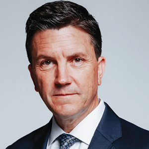 Headshot of man with blue suit