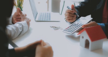 Oppenheim, Florida Discussion of State Mediation Program at a table