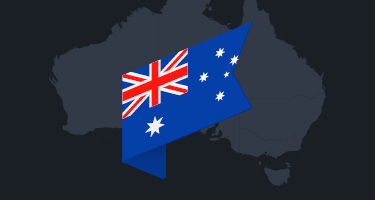 Australia flag over outline of country 