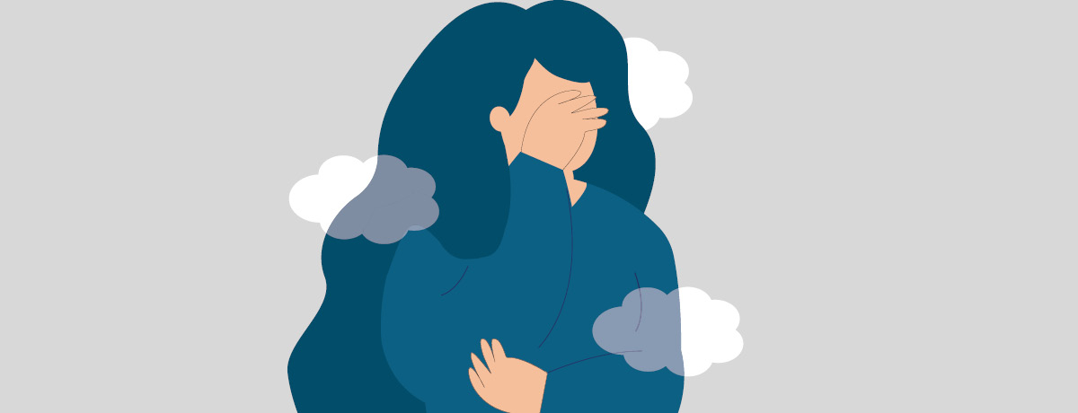 Cartoon of woman in blue shirt and hair covering her face