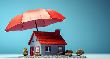 Small grey house with red roof under large red umbrella on blue background