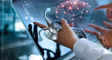 Doctors reviewing a brain scan digitally with scope 