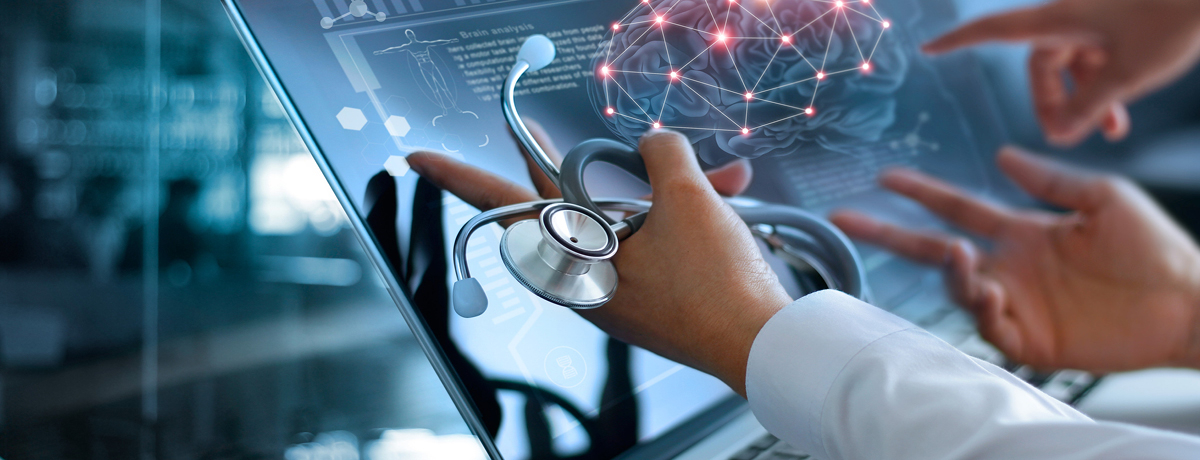 Doctors reviewing a brain scan digitally with scope 
