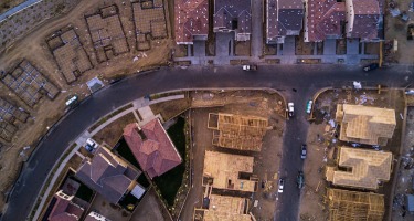 Map of a neighborhood with multiple empty lots and houses