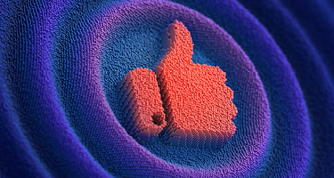3D pixelated thumbs-up icon in red and orange on a blue and purple background.