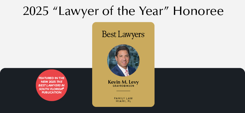 Lawyer in suit smiles for professional headshot